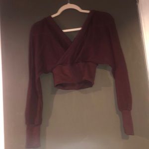 Baggy cropped long sleeve sweater. Low loose v neck.